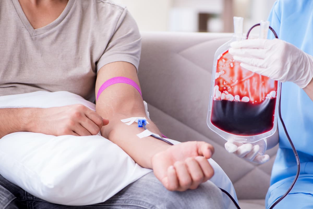 Patient getting blood transfusion in hospital clinic