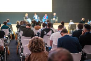 Audience listening to panel discussion