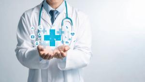 Male medicine doctor hold healthcare medical icons for the Health insurance concept in hospital background | Image Credit: Deemerwha studio | stock.adobe.com