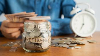 Coin in a glass bottle Image blurred background of business people sitting counting money and a retro white alarm clock, retirement, finance and saving money for future concept - Image credit: sorrapongs | stock.adobe.com