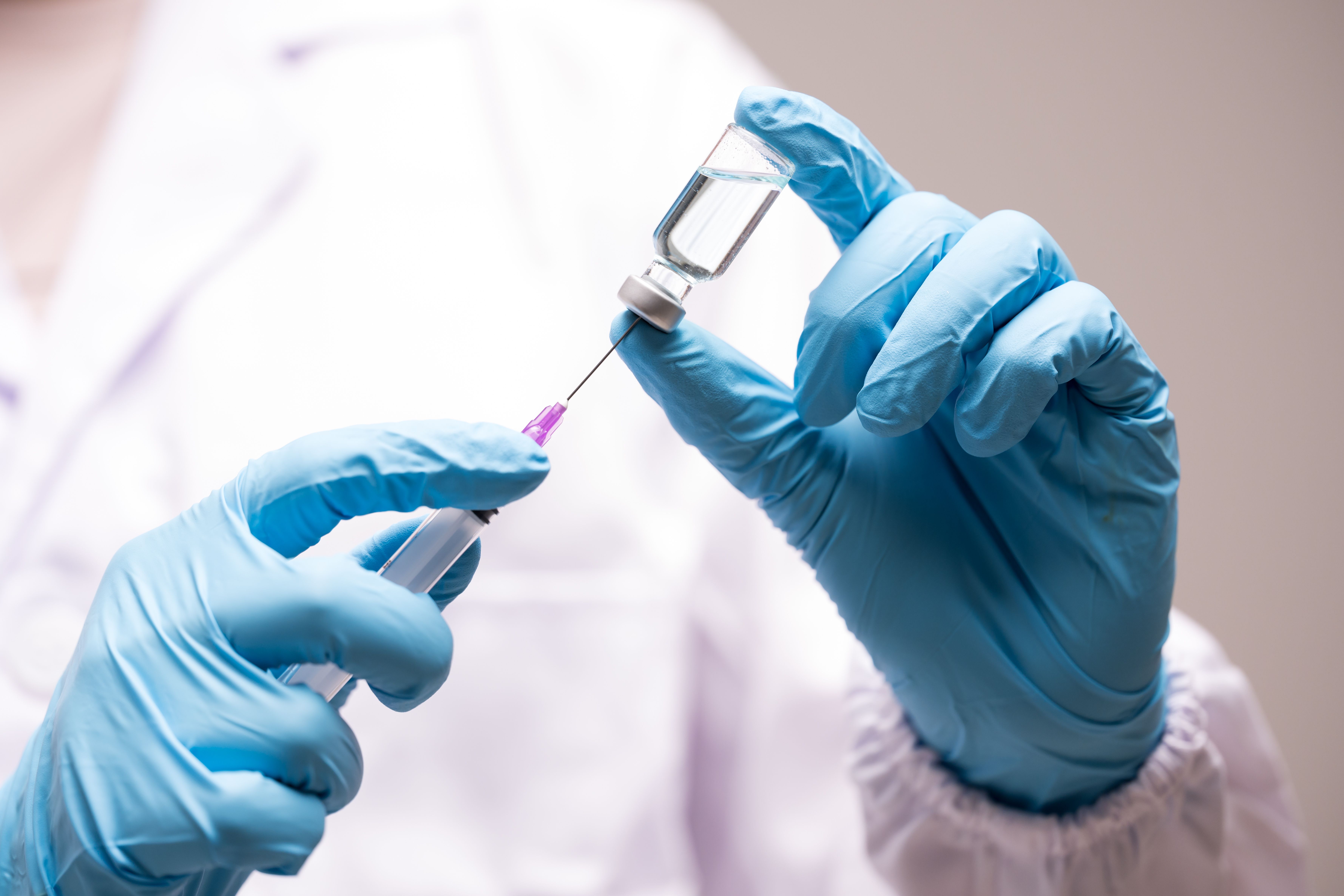 Health care worker preparing a vaccination