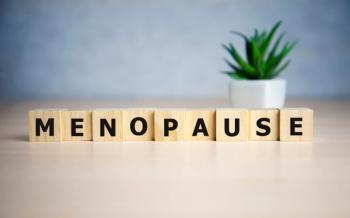 Wooden blocks that spell menopause -- Image credit: loran4a | stock.adobe.com