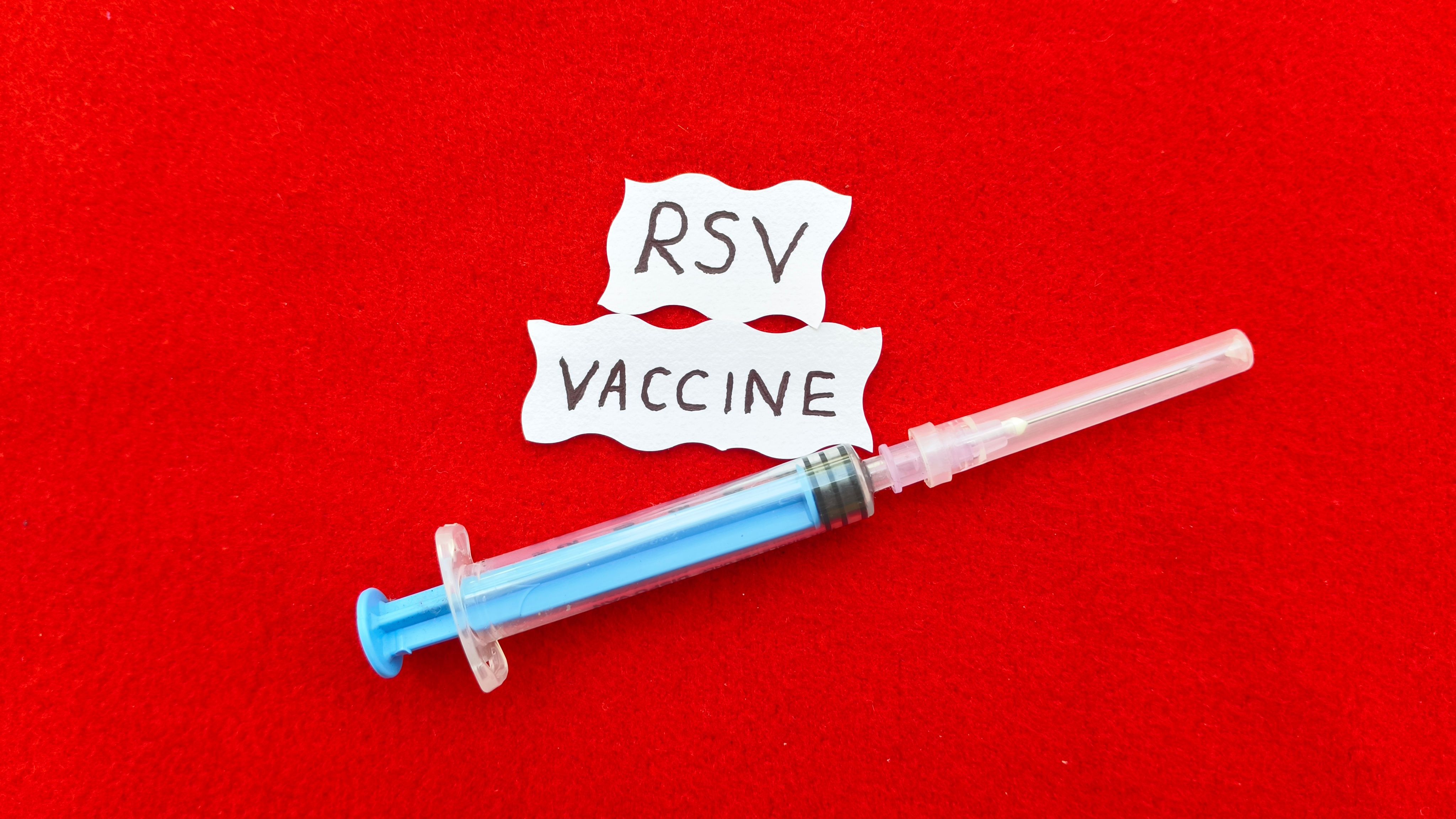 Respiratory Syncytial Virus (RSV) life-threatening disease prevention and protection antibody immunity vaccination or injection concept. Syringe near RSV vaccine word or text - Image credit: ECO LENS | stock.adobe.com