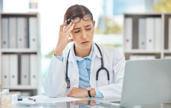 Burned out pharmacy resident -- Image credit: Anela Ramba/peopleimages.com | stock.adobe.com