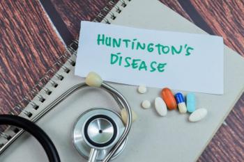 Stethoscope and paper with Huntington's Disease written -- Image credit: syahrir | stock.adobe.com