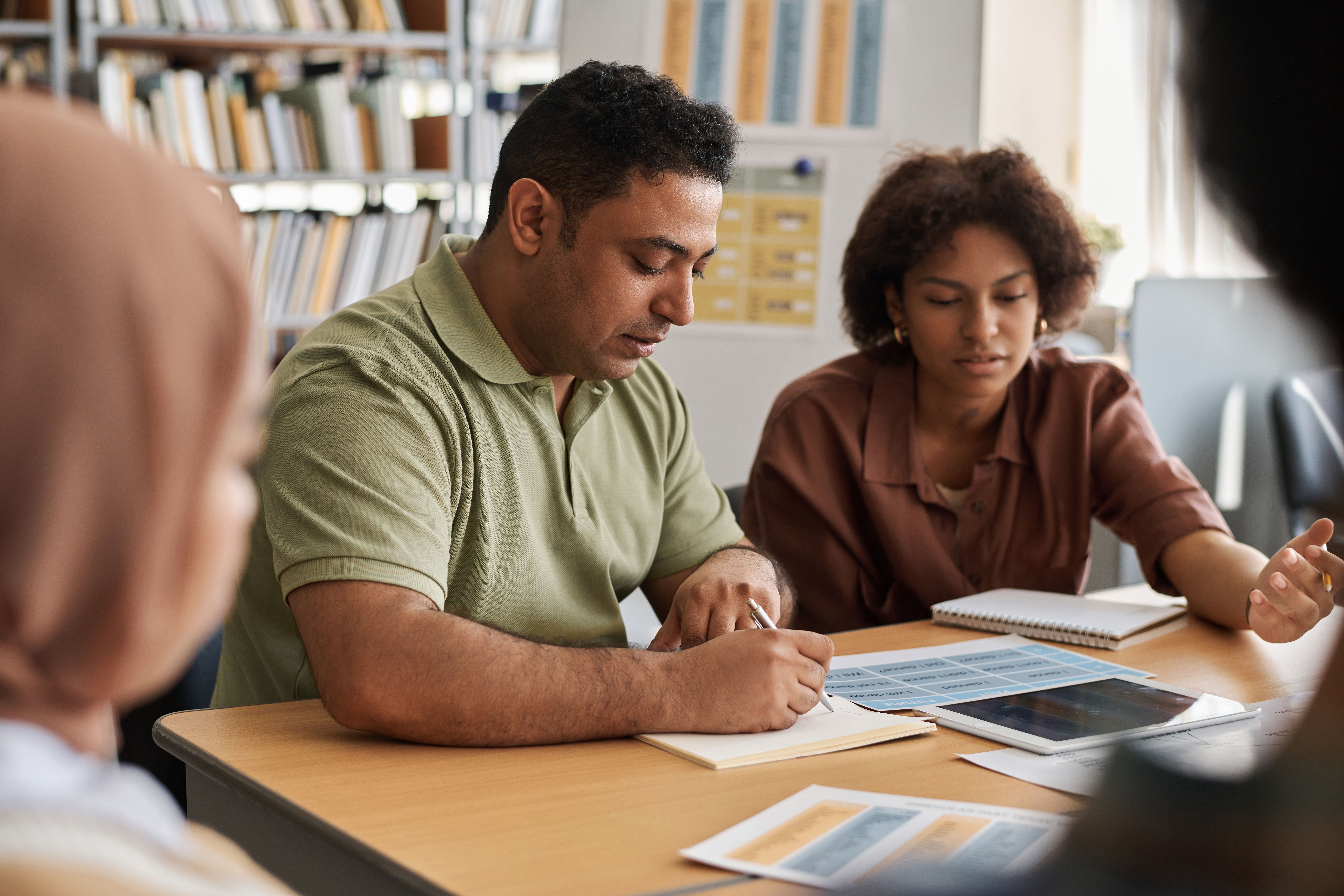 Adult students in classe -- Image credit: AnnaStills | stock.adobe.com