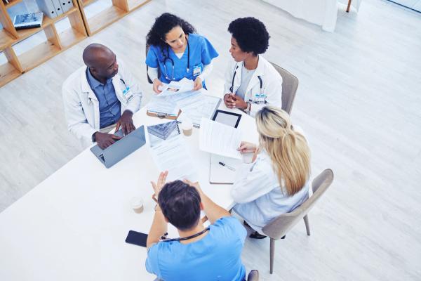 Multidisciplinary health care team -- Image credit: Sharne T/peopleimages.com | stock.adobe.com