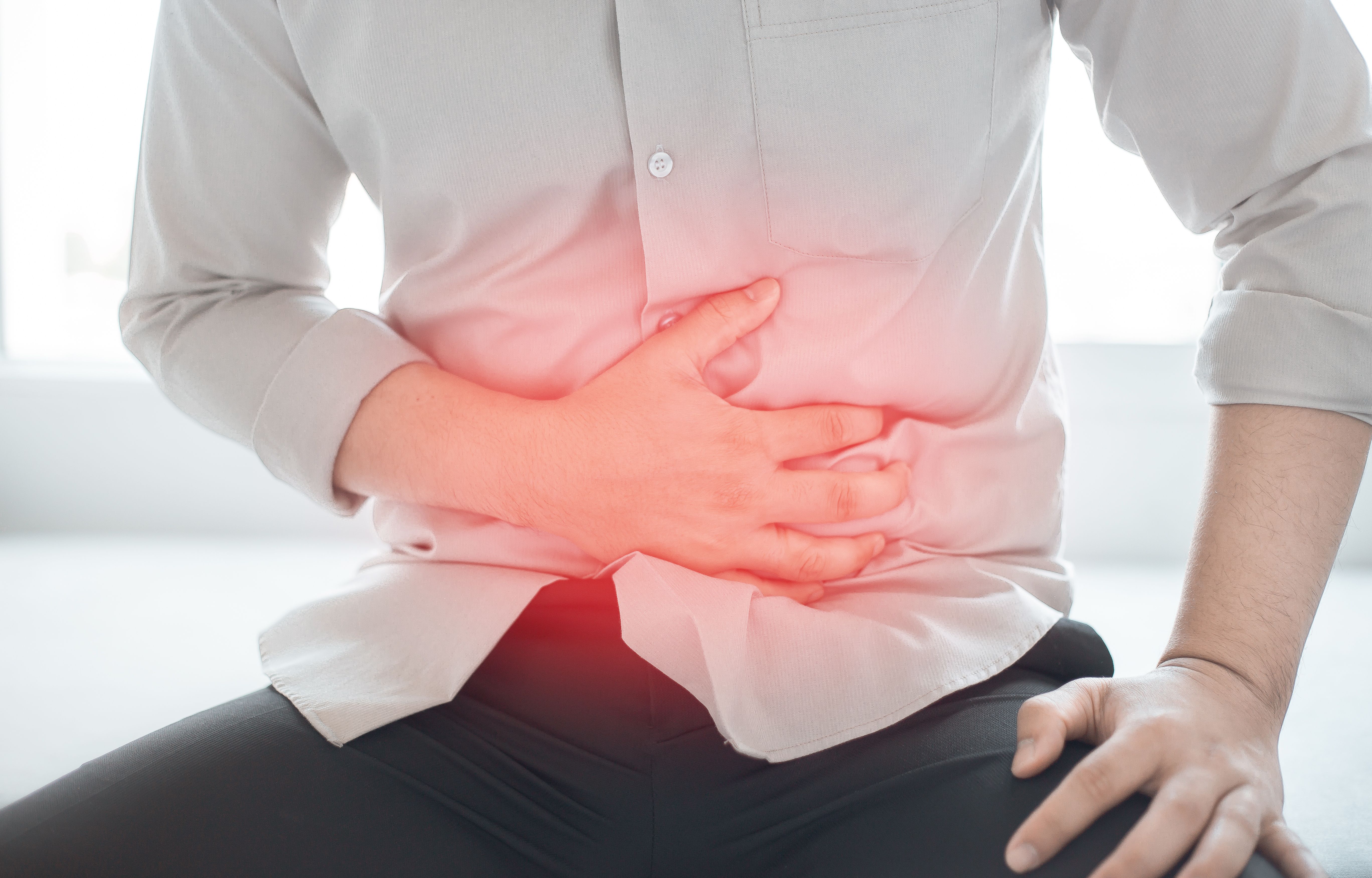 Man experiencing abdominal pain