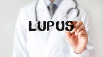 Doctor writing lupus in black marker | Image credit: MP Studio - stock.adobe.com