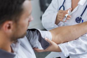 Man receiving HIV-prevention injection -- Image credit: auremar | stock.adobe.com