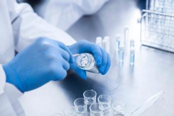 Pharmacist in specialty pharmacy preparing oral oncolytics -- Image credit: Monet | stock.adobe.com
