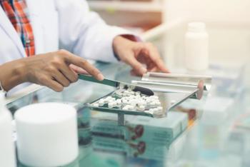 Medicine tablets on counting tray with counting spatula at pharmacy | Image Credit: sutlafk - stock.adobe.com