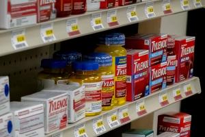 Calgary, Alberta, Canada Nov 10, 2022. A self full stock of Tylenol at a pharmacy over-the-counter medicine.
