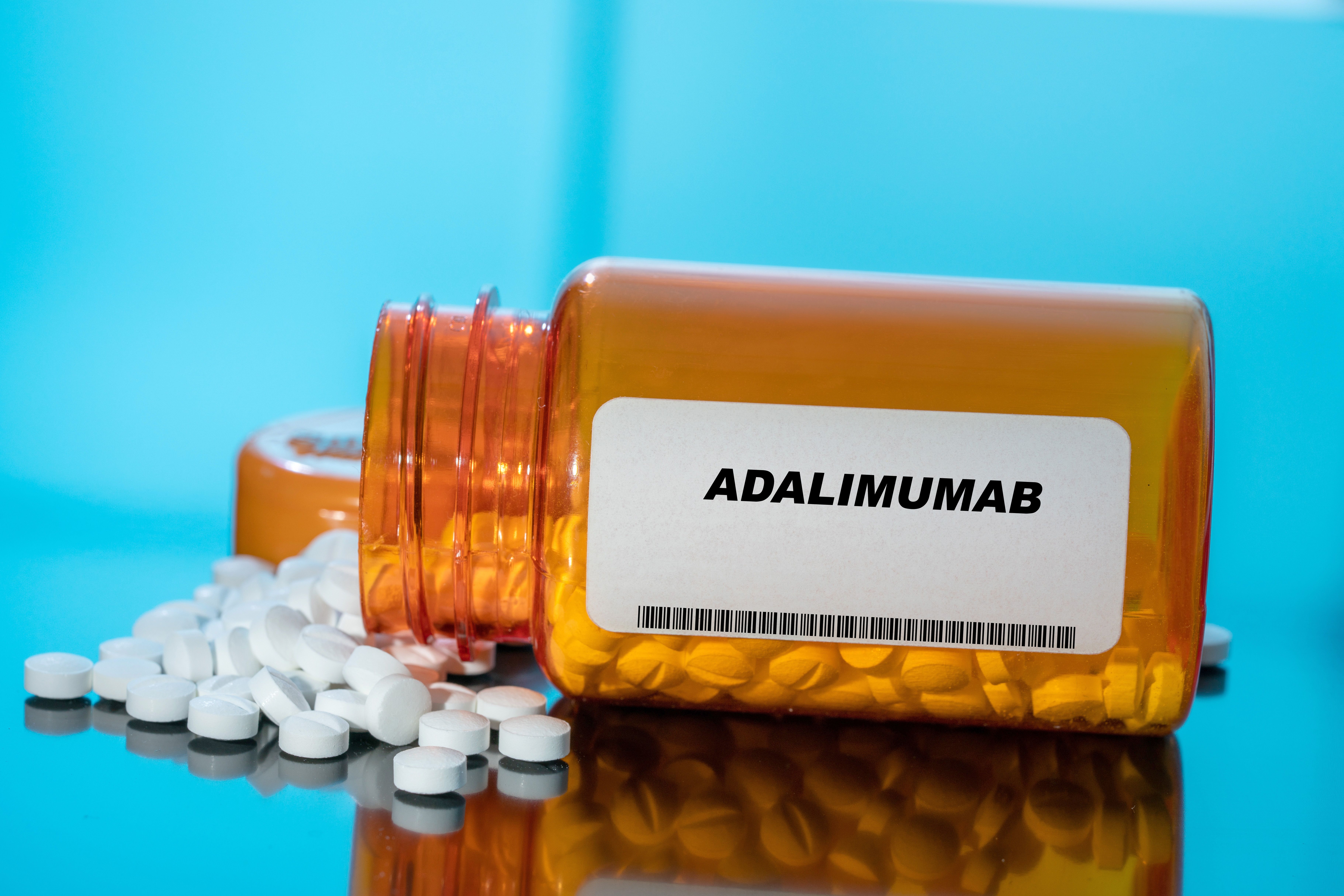 Open bottle of oral adalimumab