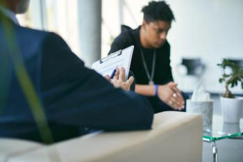 Teenager undergoing mental health screening -- Image credit: Drazen | stock.adobe.com