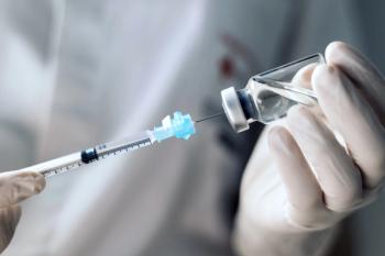 Pharmacist preparing vaccination -- Image credit: PEDROMERINO | stock.adobe.com