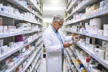 Pharmacist in a pharmacy -- Image credit: Ruan J/peopleimages.com | stock.adobe.com