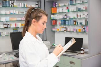 Pharmacy student working in a pharmacy -- Image credit: WavebreakmediaMicro | stock.adobe.com