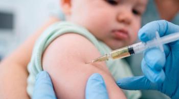 Close-up of a baby receiving an injection in the arm from a healthcare professional | Image Credit: © Стивен Щиров - stock.adobe.com
