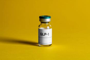 Single clear glass vial of GLP-1 medication with white label on vibrant yellow background, clinical pharmaceutical concept | Image Credit: Imran | stock.adobe.com