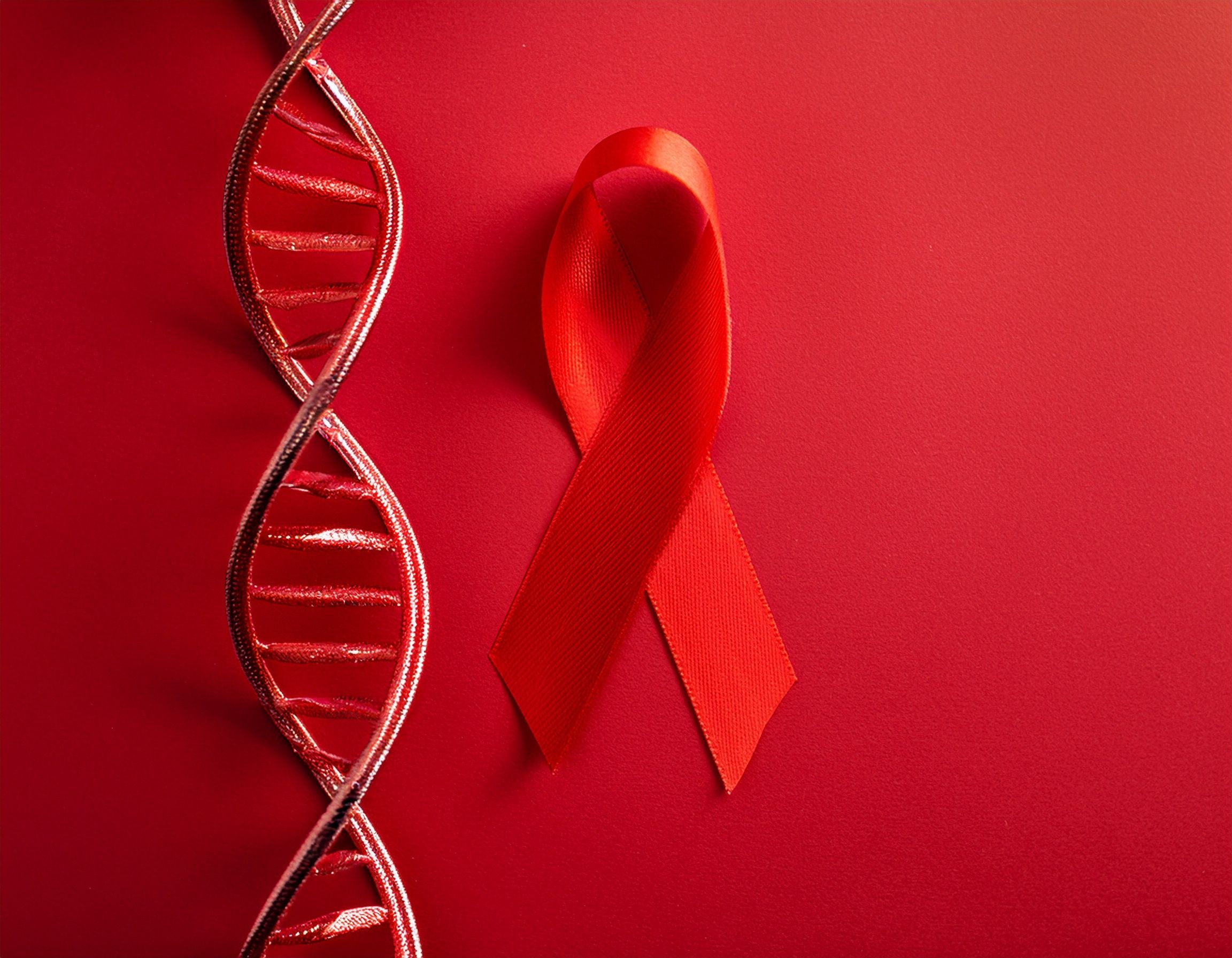 world hemophilia day awareness banner with red dna double helix and flowing ribbon on red background for genetic healthcare | Image Credit: Danielle | stock.adobe.com