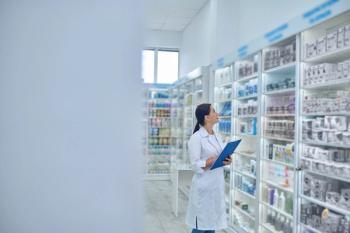 Pharmacist checking medicines in a drugstore - Image credit: Zinkevych | stock.adobe.com 