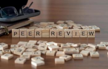 Wooden tiles spelling peer review -- Image credit: lexiconimages | stock.adobe.com