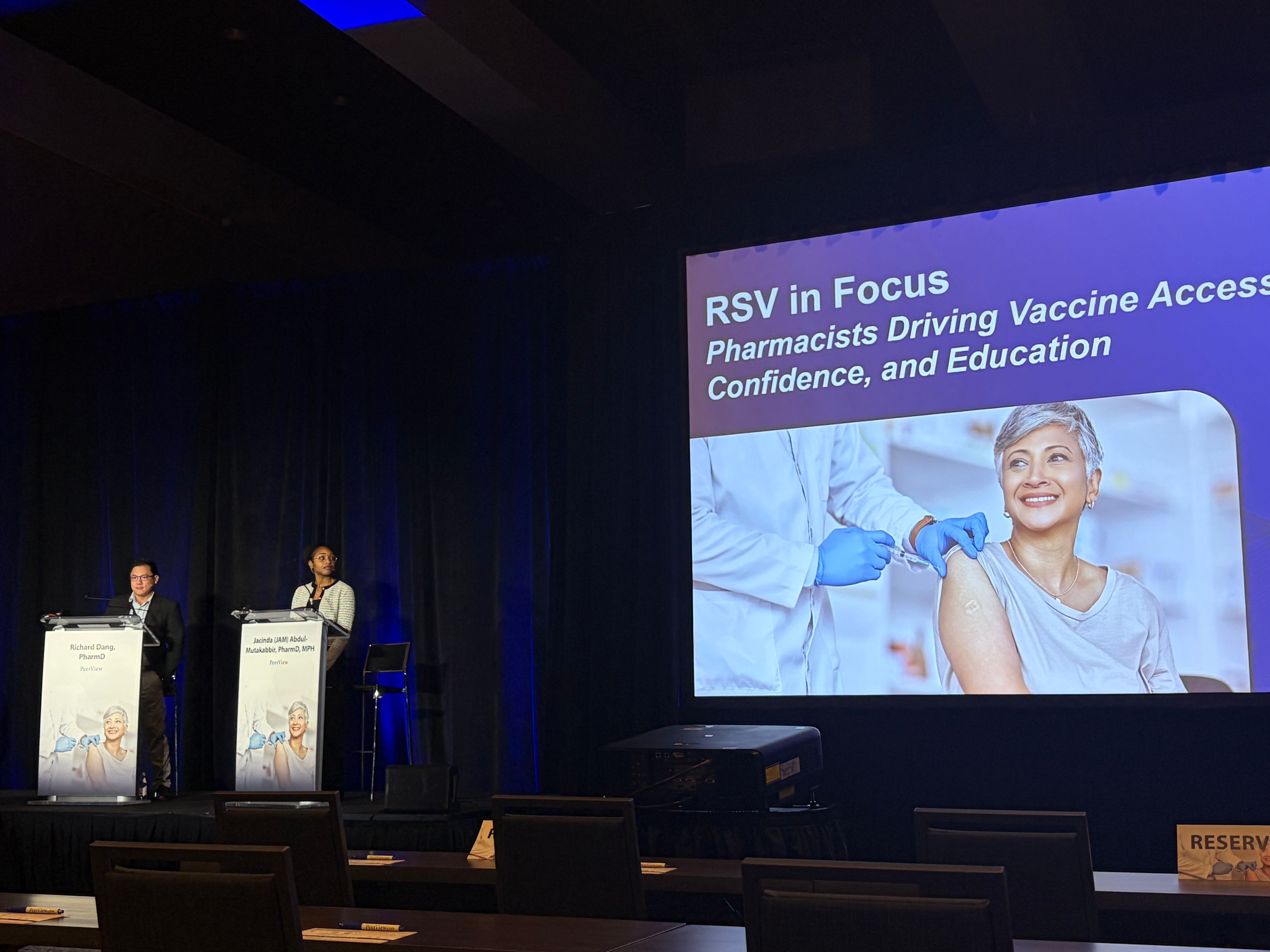 Jacinda (JAM) Abdul-Mutakabbir, PharmD, MPH, and Richard Dang, PharmD, during a satellite symposium at the American Pharmacists Association (APhA) 2026 Annual Meeting in Los Angeles, California. | Image Credit: Luke Halpern