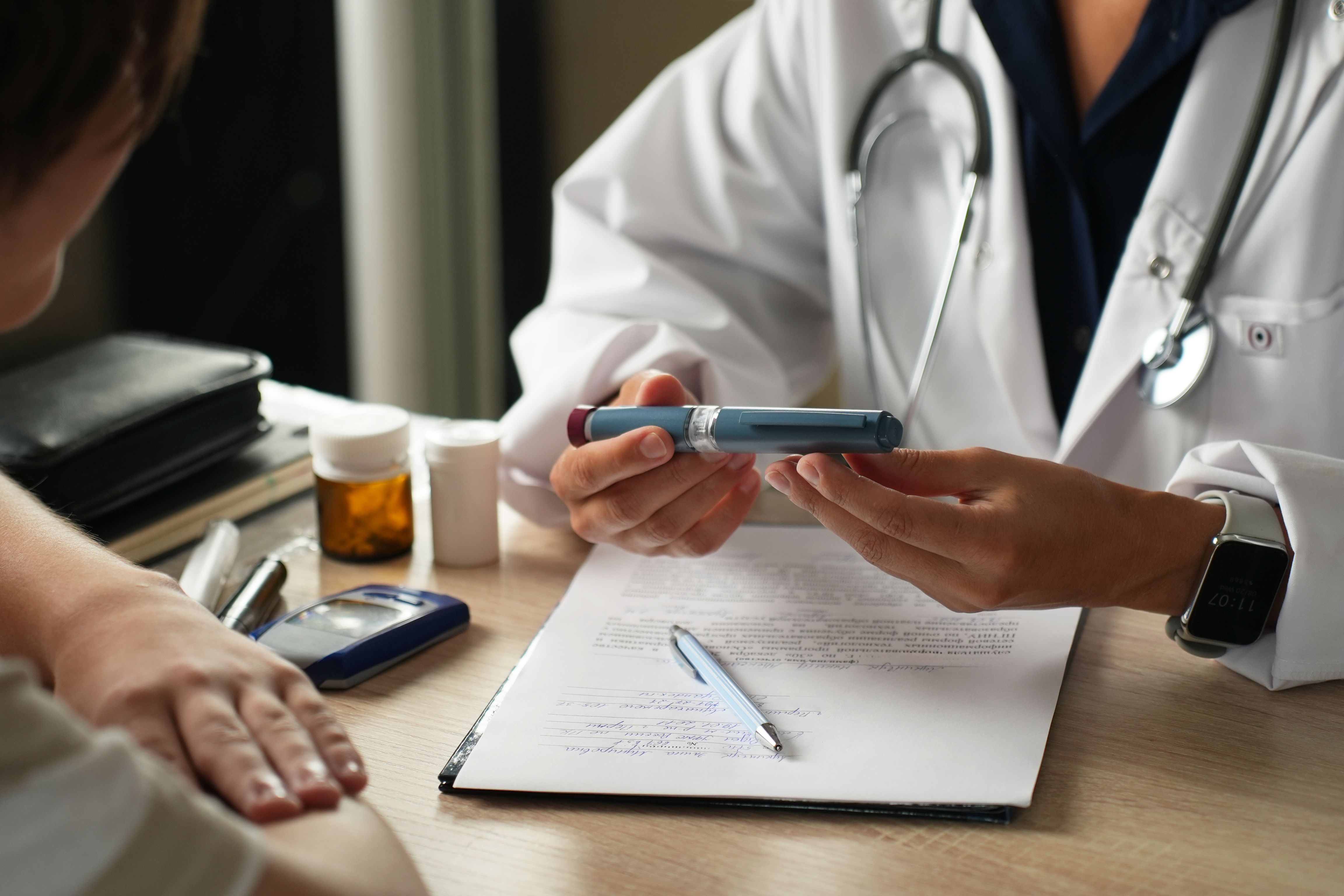 Doctor Explaining How to Use an Insulin Pen - Image credit: Gecko Studio | stock.adobe.com