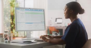 Portrait of a Black Female Medical Health Care Professional Working on Desktop Computer in Hospital Office. Clinic Head Nurse is Appointing Prescriptions Online, Updating Electronic Health Records