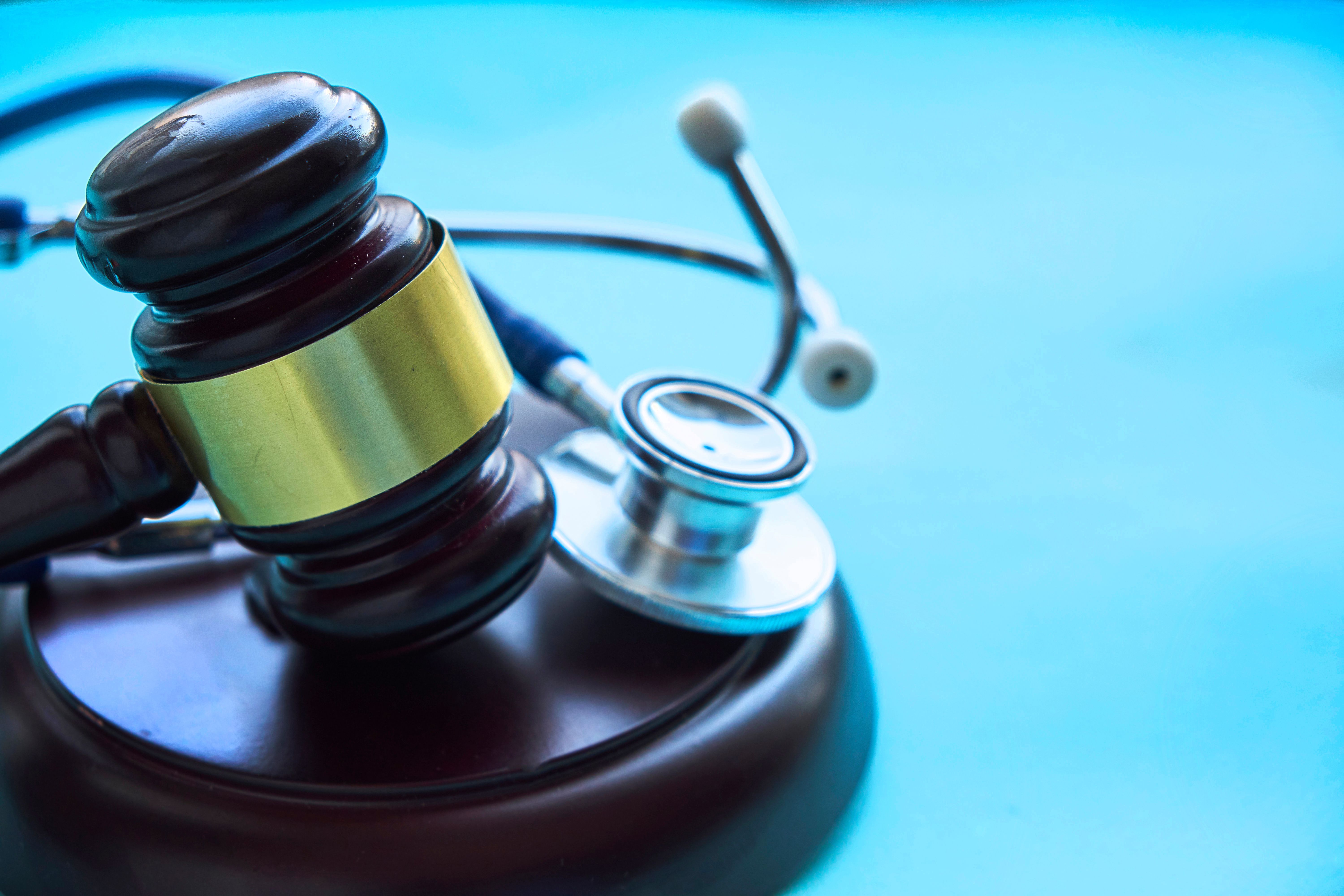 Gavel and stethoscope. medical jurisprudence. legal definition of medical malpractice. attorney. common errors doctors, nurses and hospitals make - Image credit: yavdat | stock.adobe.com