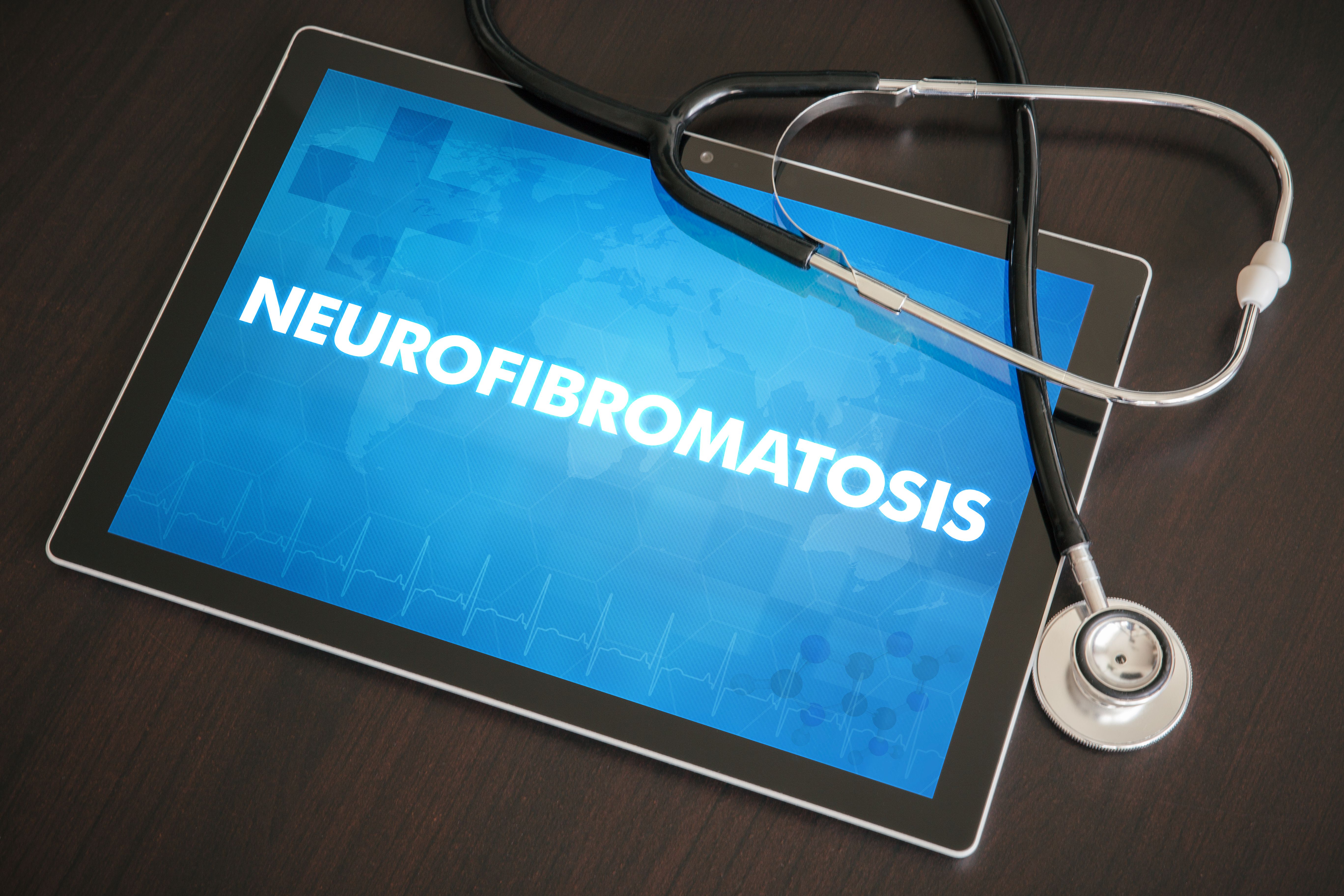 Neurofibromatosis (neurological disorder) diagnosis medical concept on tablet screen with stethoscope