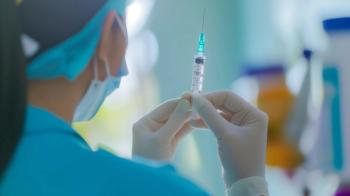 Health care professional preparing injection -- Image credit: BajimBa | stock.adobe.com