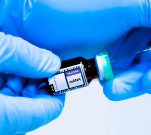 mRNA vaccine bottles and syringes for preventing coronavirus or covid-19. - Image credit: kitsawet | stock.adobe.com