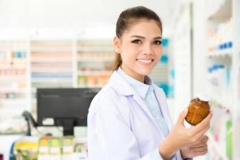 pharmacy technician checking medicine in pharmacy | Image Credit: Atstock Productions - stock.adobe.com