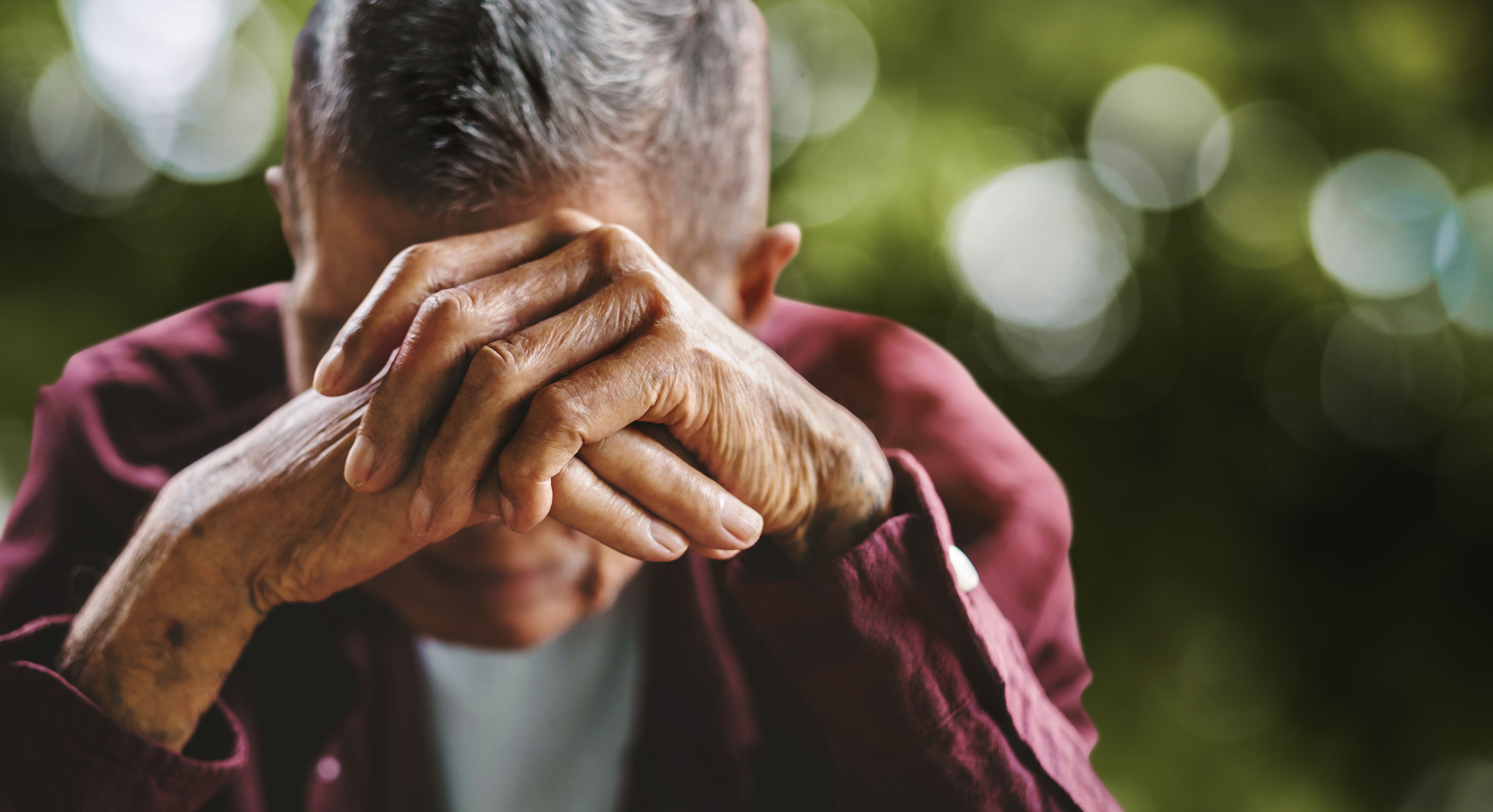 senior man covering his face with his hands. Depression and anxiety Copy space - Image credit: Nuttapong punna | stock.adobe.com