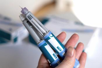Hand holding Ozempic Insulin injection pen for diabetics - Image credit: Natalia | stock.adobe.com