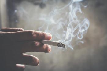 Person holding cigarette | Image Credit: © methaphum - stock.adobe.com