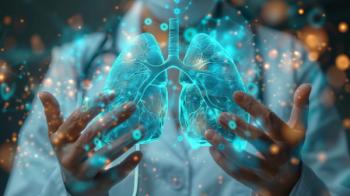 The image shows a doctor holding a pair of lungs in his hands - Image credit: pakbung | stock.adobe.com