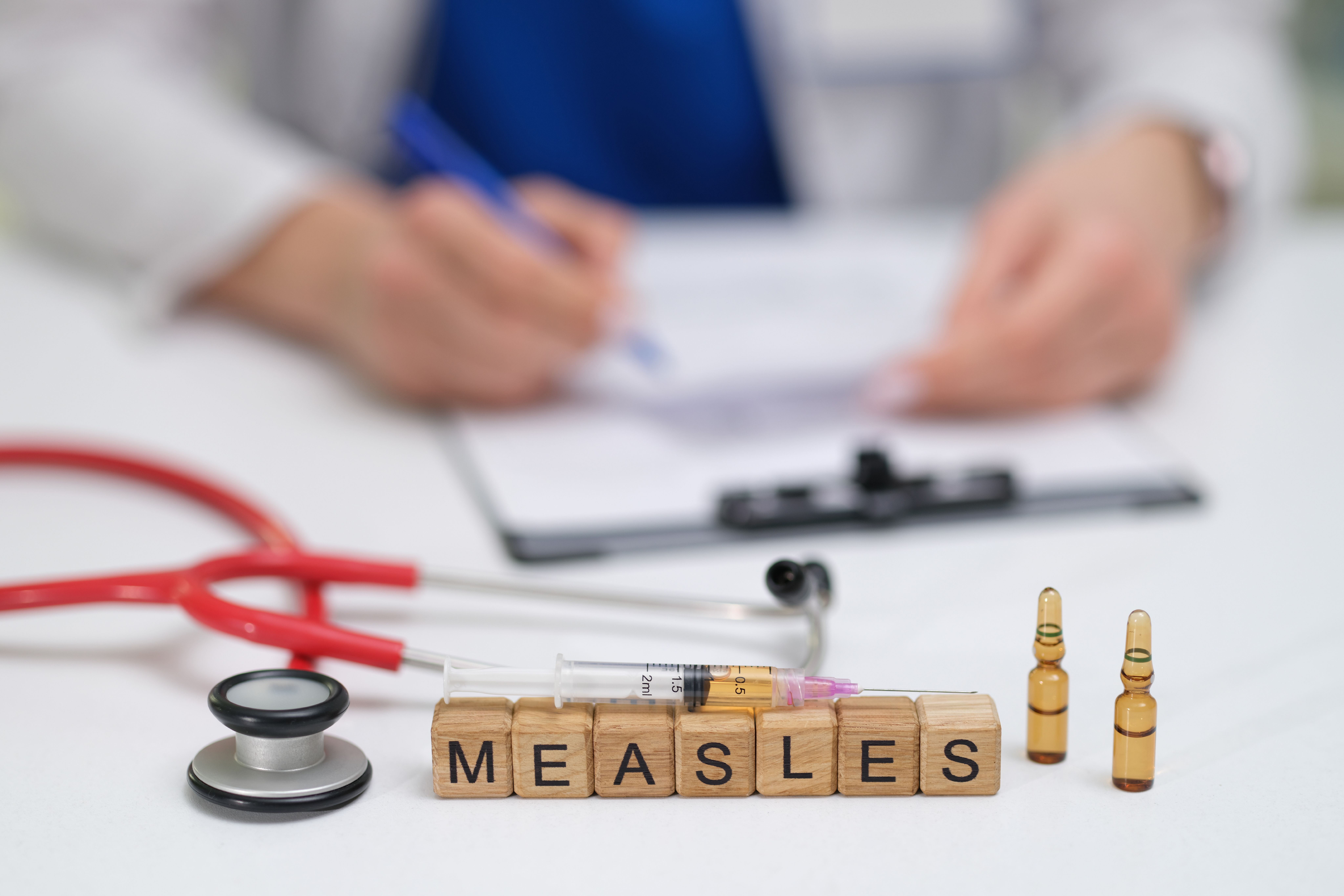 Measles spelled on wooden blocks | Image Credit: © H_Ko - stock.adobe.com