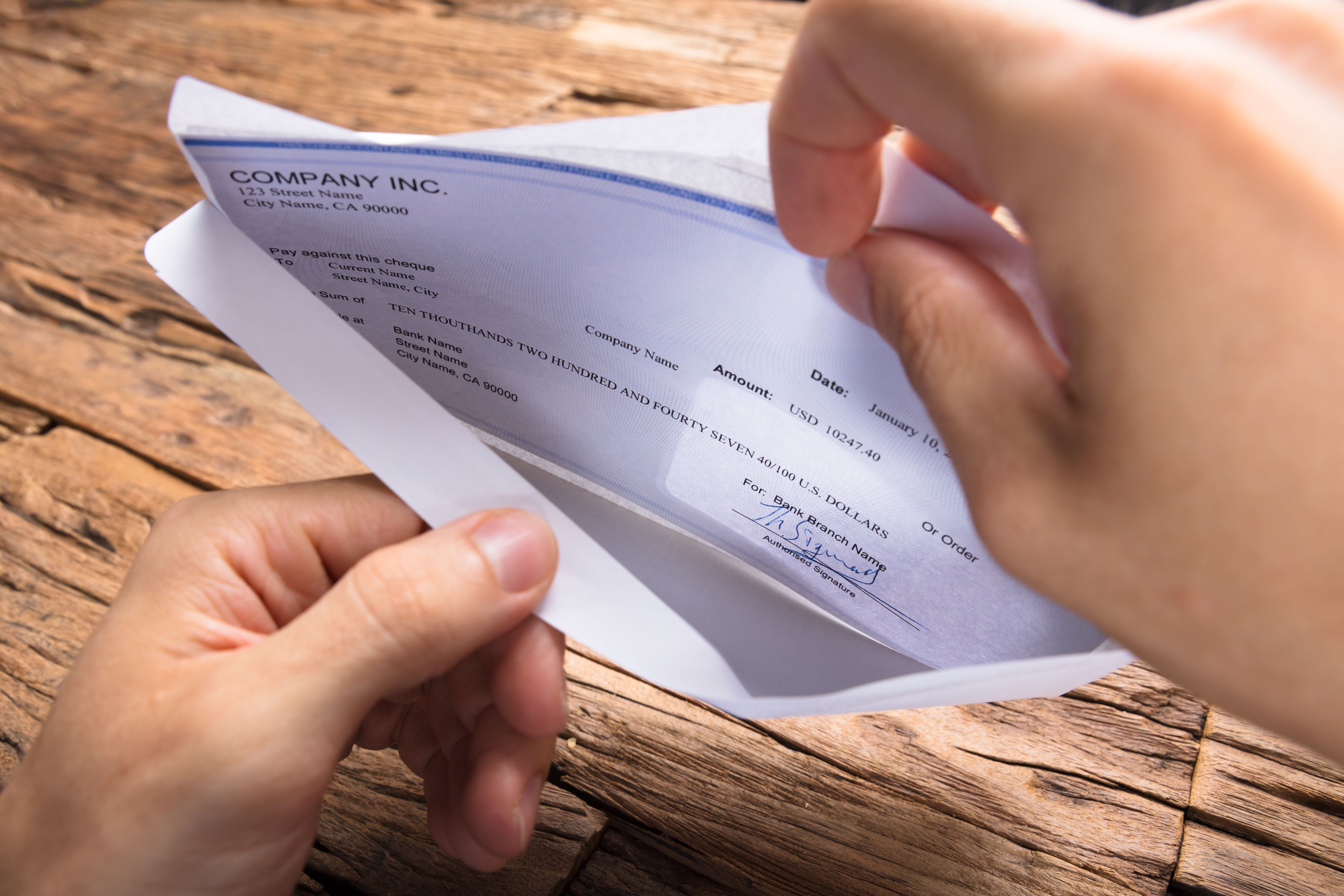 Envelope with paycheck