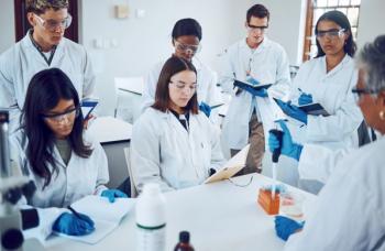 Science, students and education in a medical laboratory writing notes during scientist lecture or lesson with mentor or teacher. Medical men and women for training and learning in chemistry class - Image credit: D Lahoud/peopleimages.com | stock.adobe.com