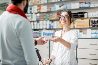 Pharmacist selling medications in the pharmacy store - Image credit: Rh2010 | stock.adobe.com