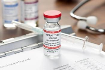 Hepatitis B Vaccine Vial On Desk - Image credit: Sherry Young | stock.adobe.com