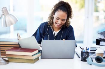 Pharmacy student in school -- Image credit: Rene La/peopleimages.com | stock.adobe.com