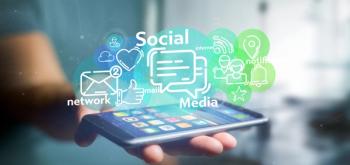 A cloud of social media network icon on Phone | Image Credit: Production Perig - stock.adobe.com