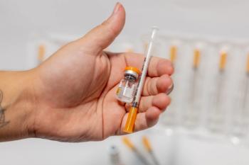 Vials of Tirzepatide medication and insulin syringes for weight loss and diabetes treatment - Image credit: Lebasi Fotografia