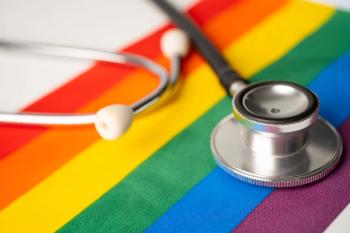 Black stethoscope on rainbow background, symbol of LGBT pride month celebrate annual in June social, symbol of gay, lesbian, gay, bisexual, transgender, human rights and peace - Image credit: amazing studio | stock.adobe.com