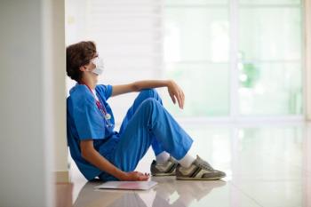 Exhausted health worker | Image credit: famveldman - stock.adobe.com