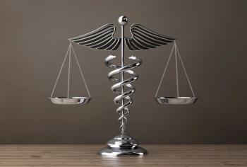 Silver Medical Caduceus Symbol as Scales. 3d Rendering - Image credit: doomu | stock.adobe.com